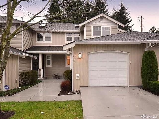 One care garage and one car parking space in front of garage