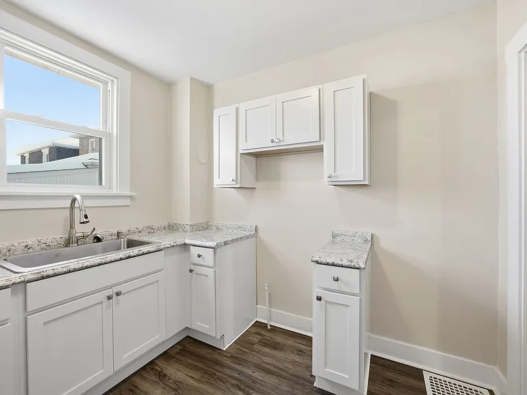 Charming Updated 2BR Home with New Flooring & Rear Porch — Photo 10