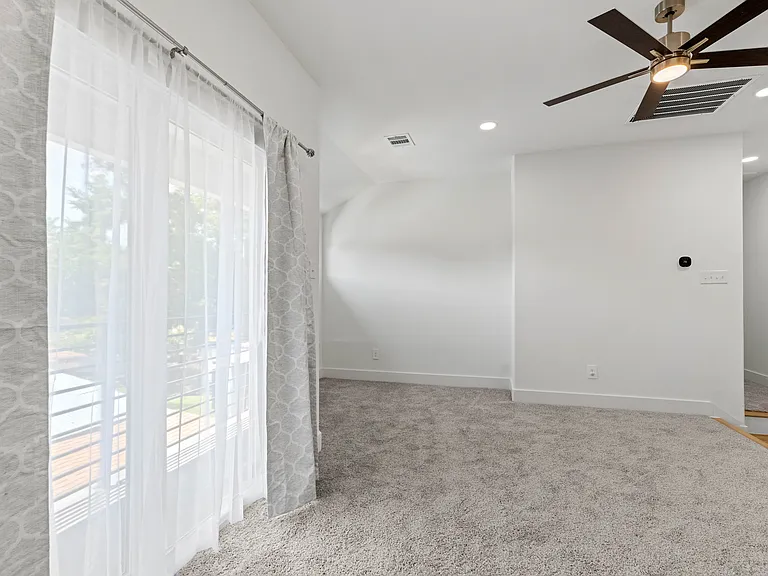 This workspace has a balcony and the HVAC controls for upstairs. The area's main dimensions are approximately 10' x 12', with alcove space on the ends.