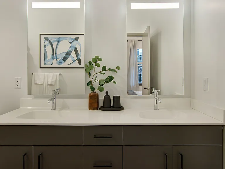 Double vanities and linen storage space*