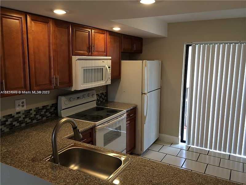 1st image of 5093 W 12th Ln #D-4