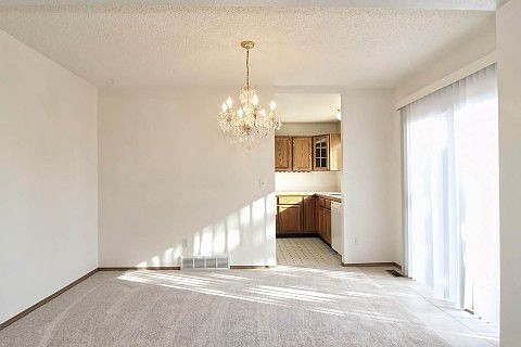 Dining Room slider opens to Deck & outdoor living area