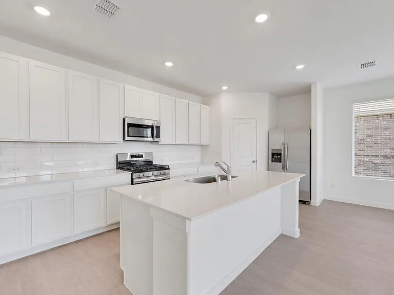 Stunning and updated kitchen with Refrigerator and walk-in Pantry!