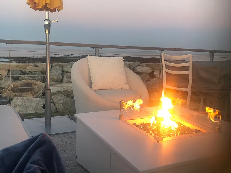 Lovely outdoor space to grill, relax, have a fire or just watch the ocean.