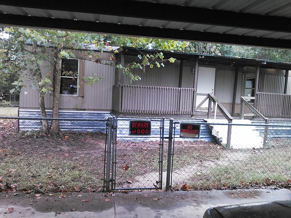 Front View With Carport