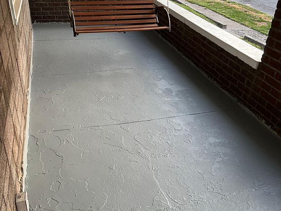 Front porch with swing.