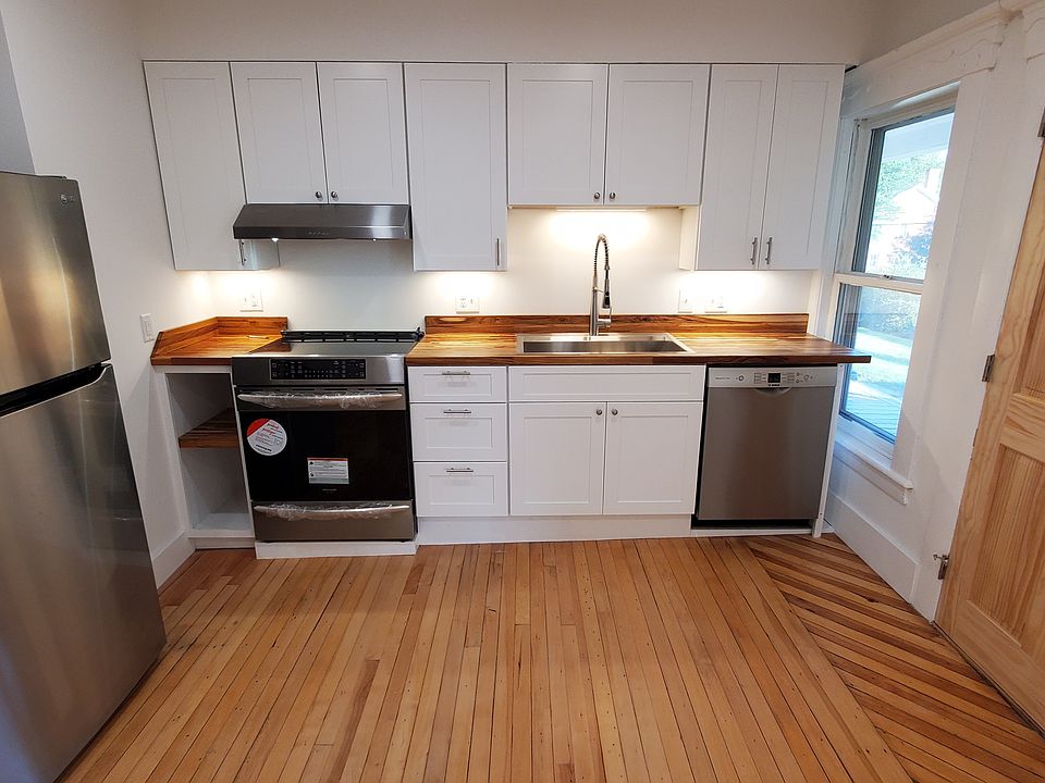 All new kitchen, range, diswasher, teak counter top.
