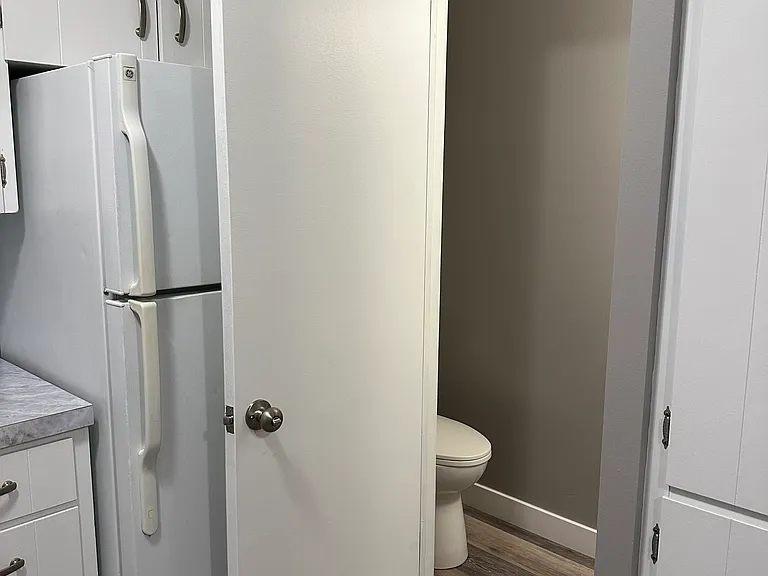 1/2 bath off kitchen, updated townhome.