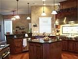 Rich cabinets and granite