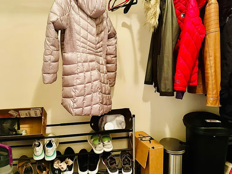 Shoe and Jacket Area with Additional storage.