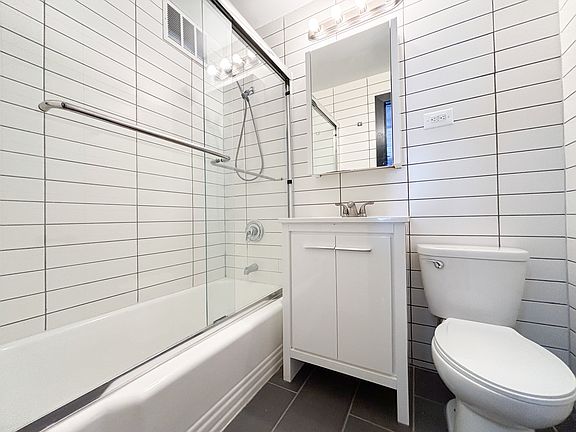 5th image of 318 E 126th St APT 4B