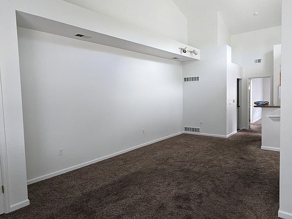 living area
electric fireplace on far right wall