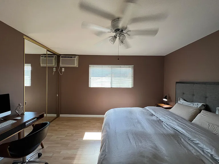 Please note: Pre-renovation photo shown for layout reference. Brand-new flooring has since been installed.