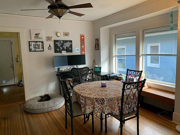 Dining room including window bench with storage