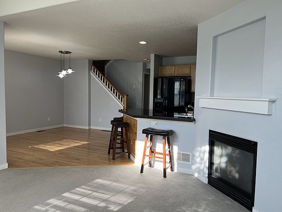 Front Door (not visible) opens to Dining Area, facing Kitchen. Very desired model in Park Place Townhomes!