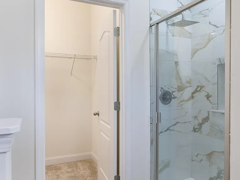 Tiled Master Bath Shower w/rainfall head
Walk-in closet