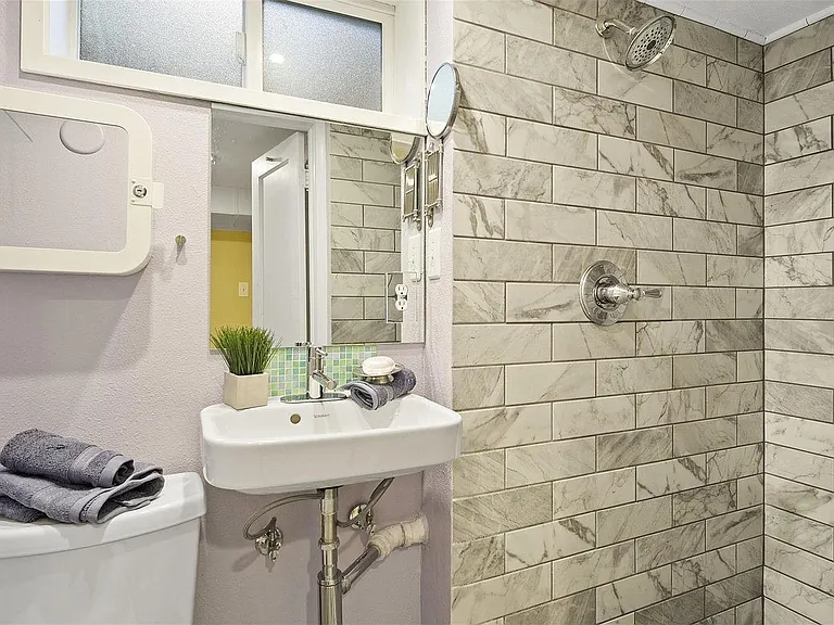 Newly remodeled bathroom off bedroom