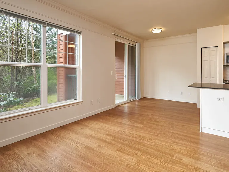 Living Room with Balcony and Hard Surface Flooring