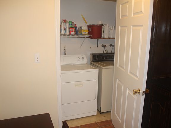 Washer and Dryer off kitchen