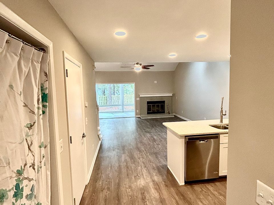 Front hallway
Washer & Dryer to left
Downstairs bedroom behind
Downstairs bath to right
Kitchen ahead to right
Sunroom straight ahead