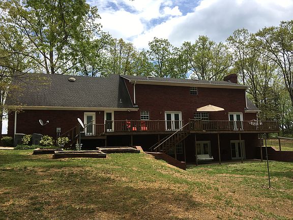 Back w/upper deck and patio