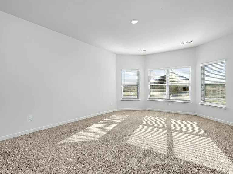 The master suite has a large bedroom, ensuite bathroom and a walk-in closet.
