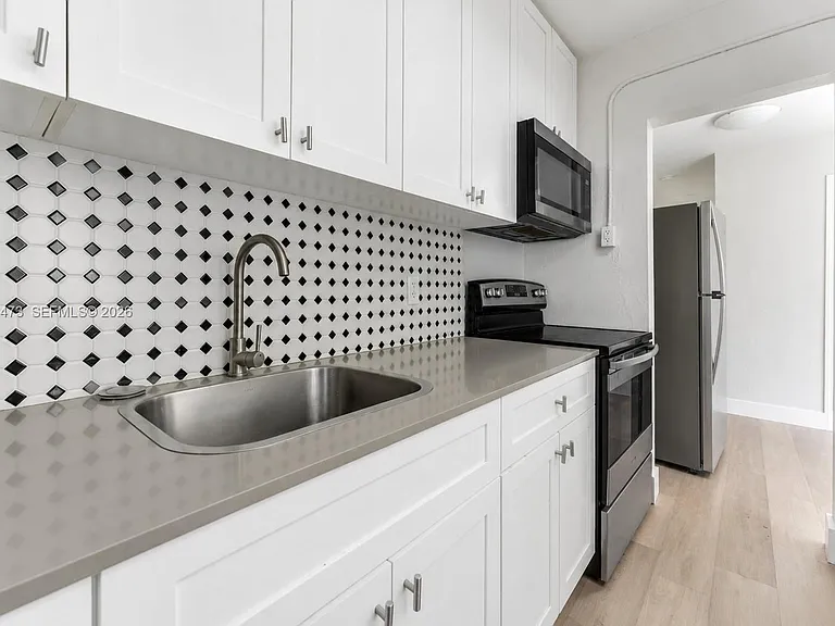 6647 SW 59th Pl #101 — Photo 8