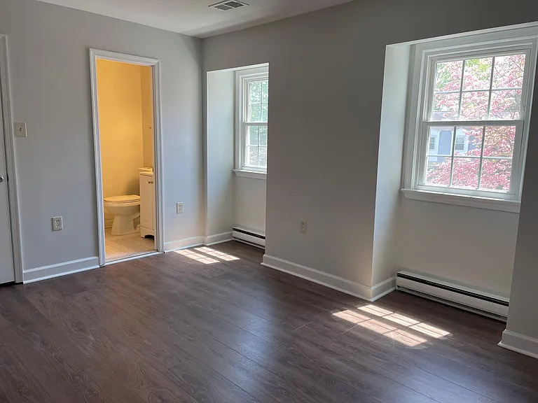 Main bedroom with half bathroom
