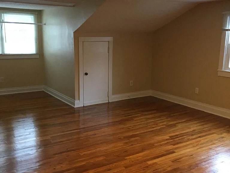 Bedroom alcove with attic storage