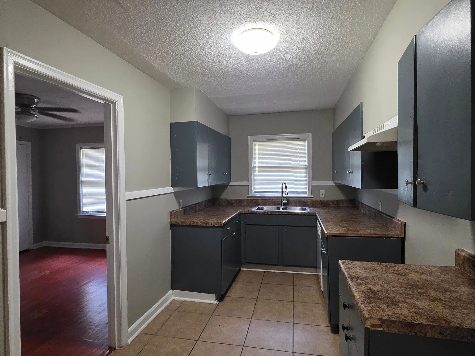 Inviting 3-Bedroom Home with Two Living Areas & Stylish Kitchen — Photo 4