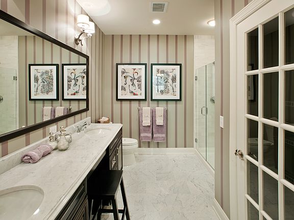 Concord Grand features Master Bath with double vanity and seated shower