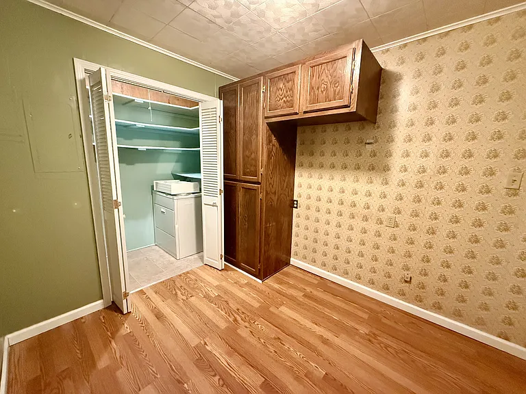 Bonus space with laundry closet and storage.
