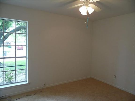 Bedroom with new carpet.