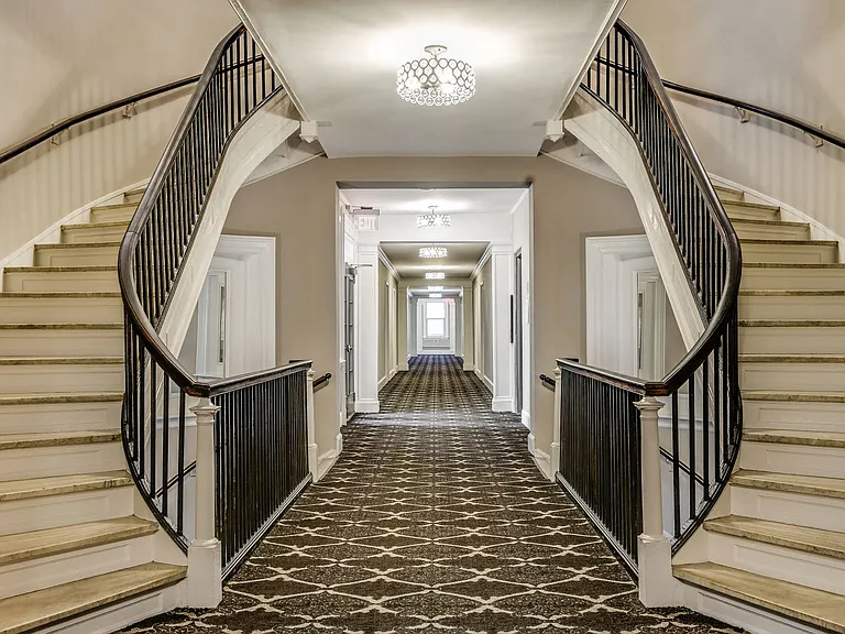 Hallway with grand staircase