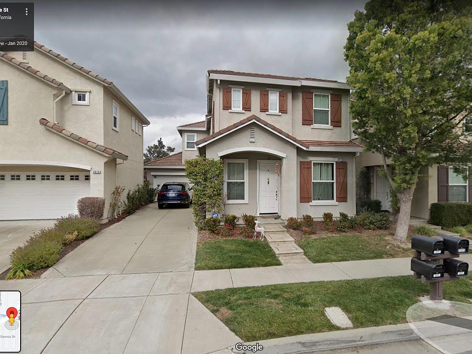 Front. Long driveway with sliding room entry. Mailbox in front.