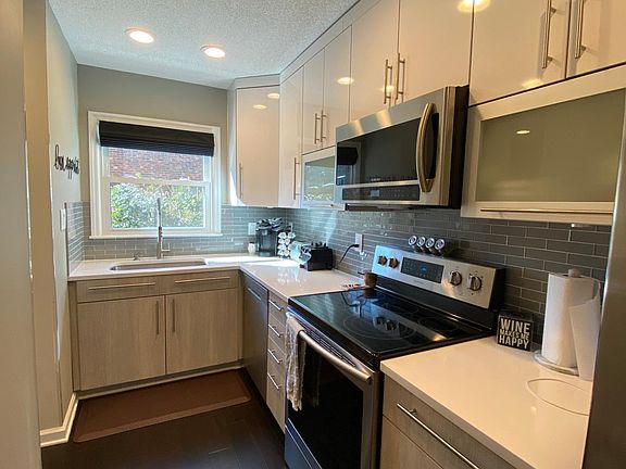 New stainless steel appliances in kitchen