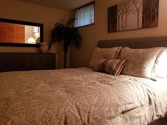 Bedroom with queen bed (has a large double closet)