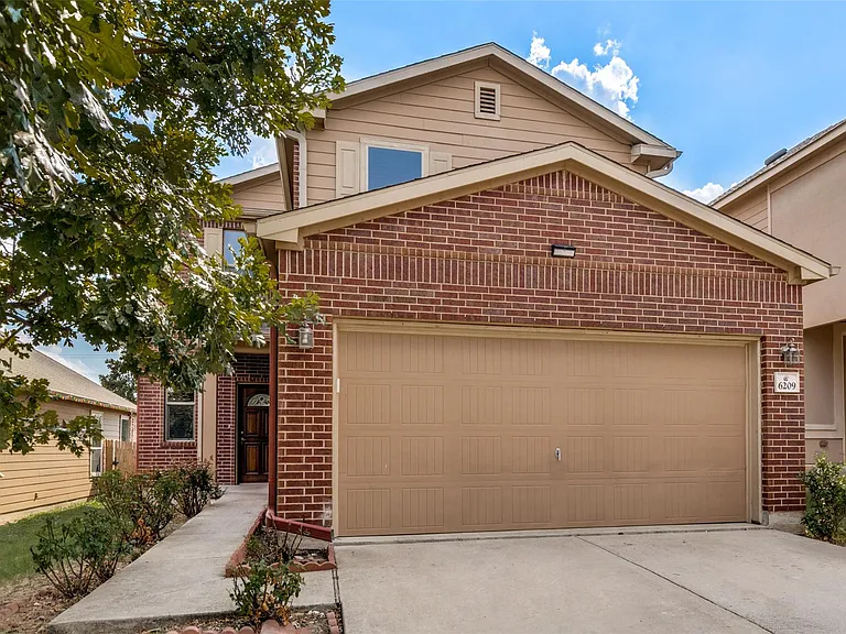 6209 Garden Rose Path — Photo 2