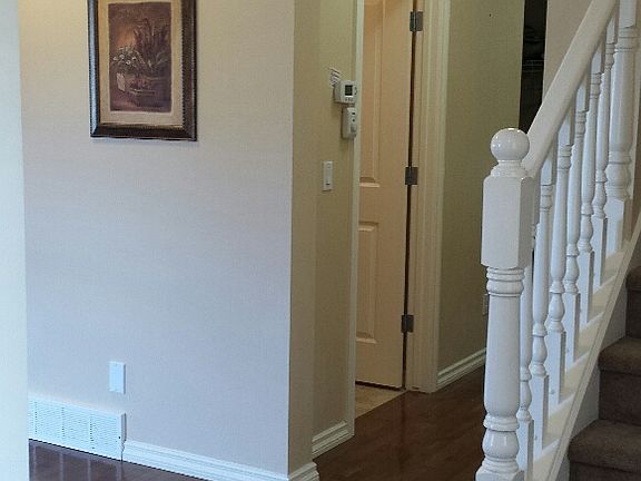 To powder room and laundry and basement