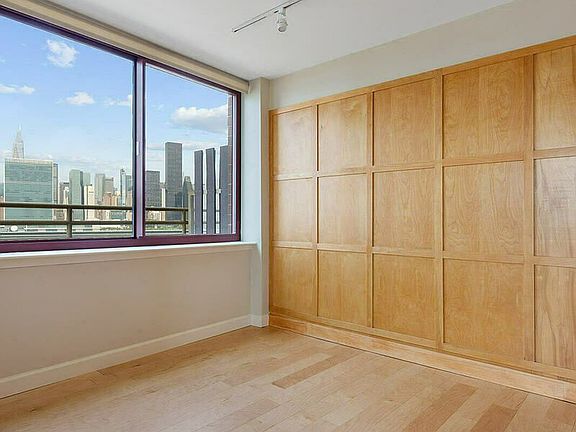 3rd image of 4-74 48th Ave APT 14A