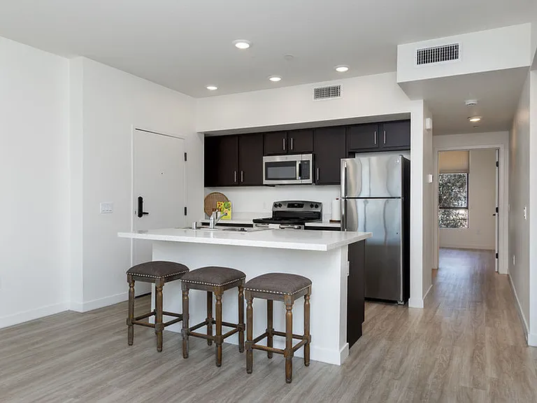 Kitchen with Large Island and Open Living Area