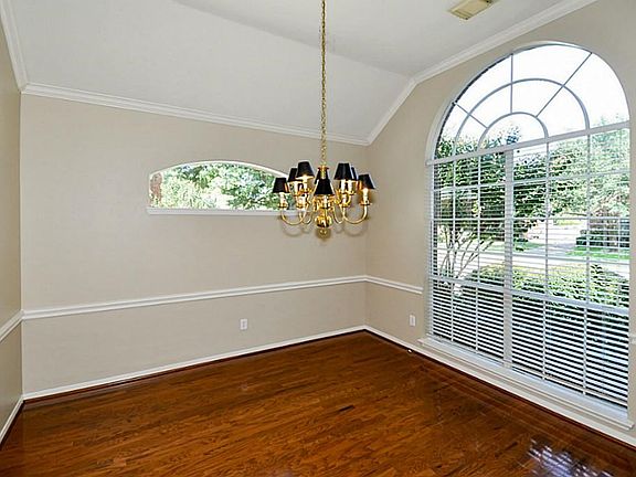 Dining room with beautiful window.