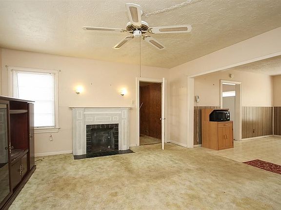 View of living room and dining room.