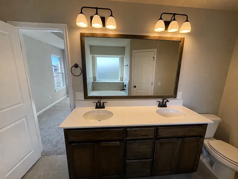 Master Bathroom with bathtub and standing shower