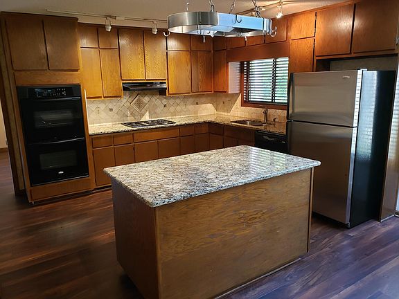 Kitchen with Island and Gas Stove