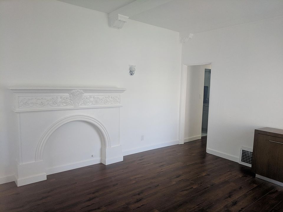 Living room, facing hallway to bedrooms.