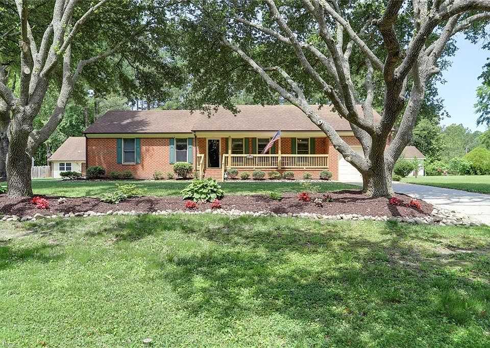 Welcome to 1256 Saint Brides Rd W (this property has two generous driveways, plus a huge addition on the back making it much larger than it appears)