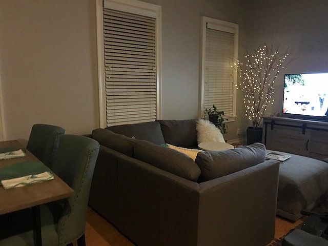 Evening view. Blinds in living room/kitchen area. Cellulose shades in bathroom and bedroom