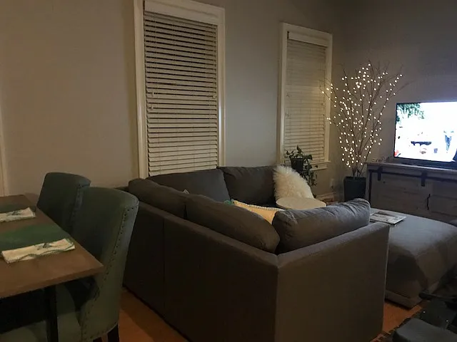 Evening view. Blinds in living room/kitchen area. Cellulose shades in bathroom and bedroom