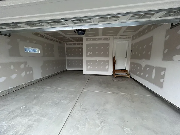 2 Car Garage with space for storage (far left)